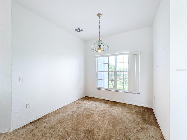 empty room featuring carpet flooring