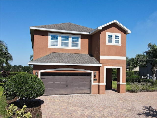 view of front of property featuring a garage