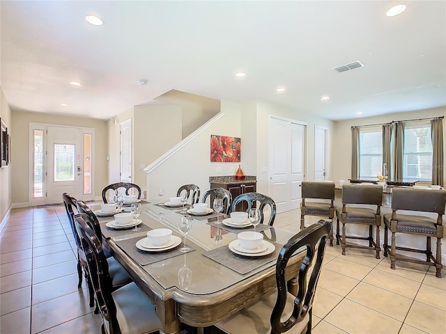 dining space with light tile patterned floors