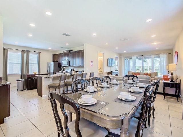 dining room featuring light tile patterned floors