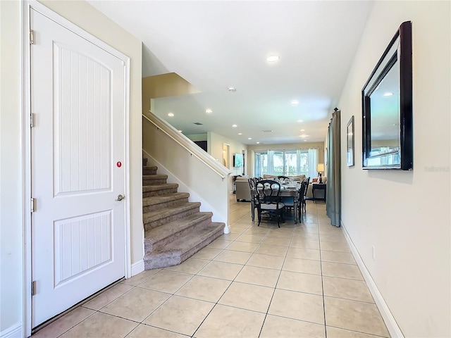 stairs with tile patterned flooring