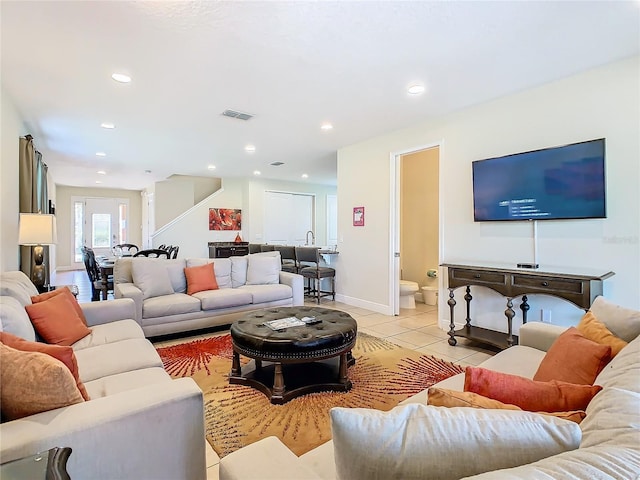 living room featuring light tile patterned floors