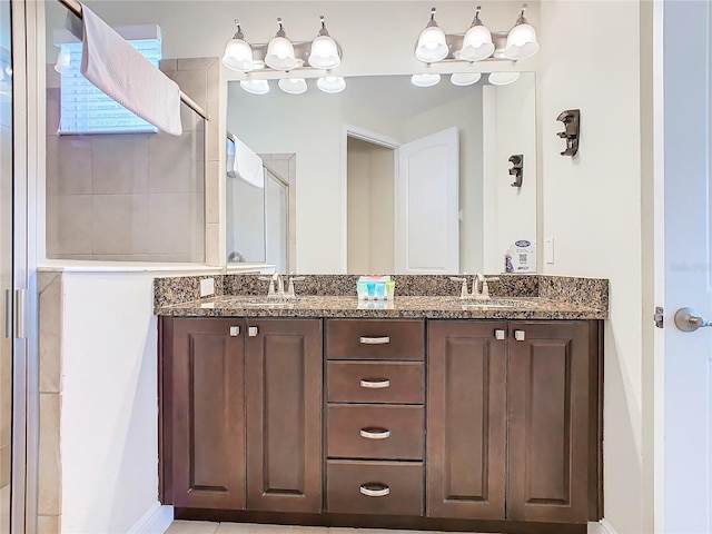 bathroom with vanity and an enclosed shower