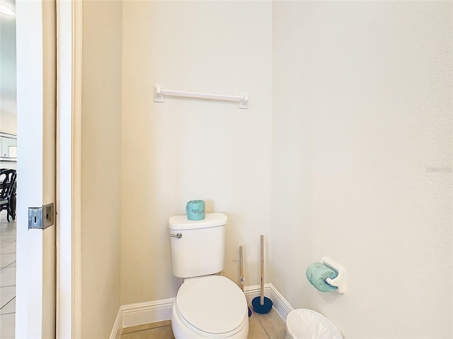 bathroom featuring tile patterned floors and toilet