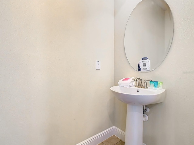 bathroom featuring tile patterned flooring