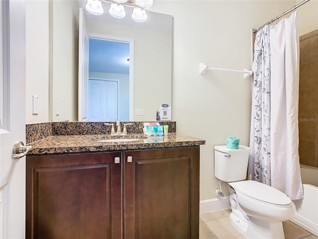 full bathroom with shower / tub combo with curtain, tile patterned flooring, vanity, and toilet