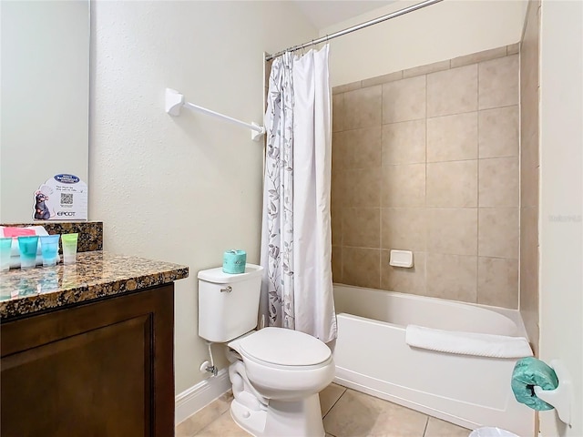 full bathroom featuring tile patterned flooring, shower / bath combo with shower curtain, vanity, and toilet