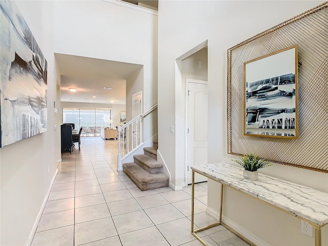 foyer with light tile patterned flooring