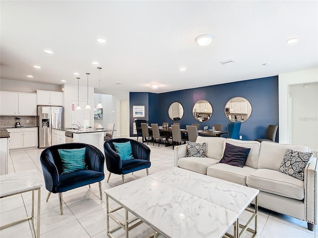 living room featuring light tile patterned floors