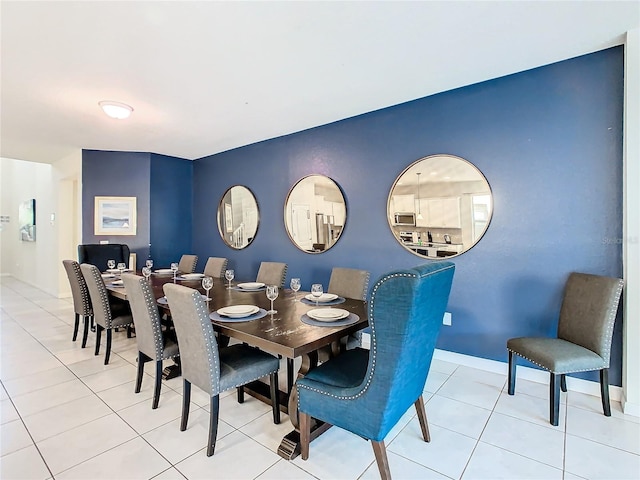 dining room with light tile patterned floors