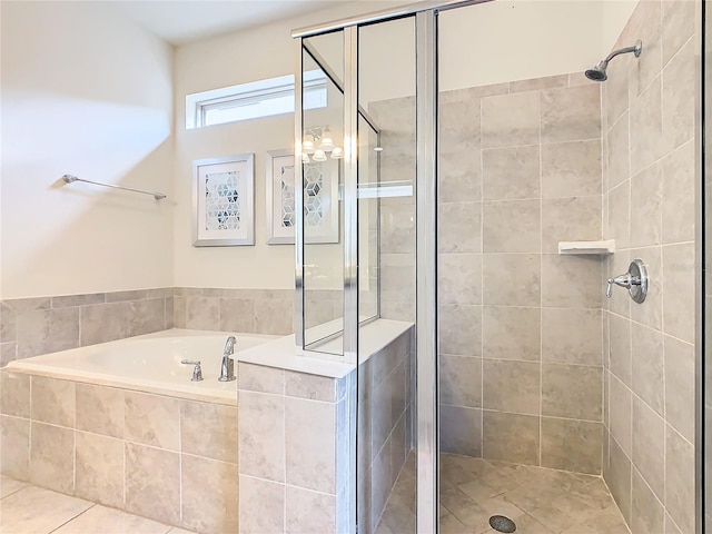 bathroom with plus walk in shower and tile patterned flooring