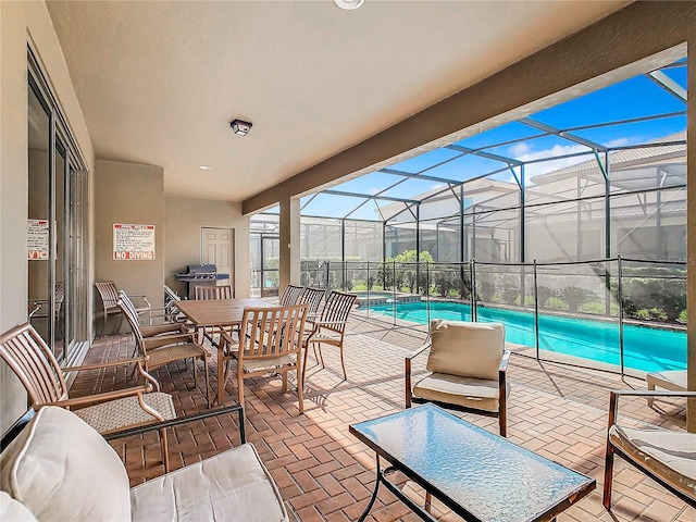 view of patio / terrace with glass enclosure