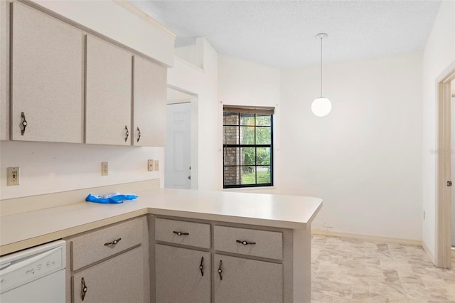 kitchen with pendant lighting, white dishwasher, kitchen peninsula, a textured ceiling, and gray cabinets