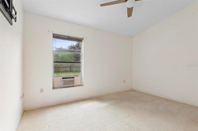 unfurnished room featuring carpet floors, cooling unit, and ceiling fan