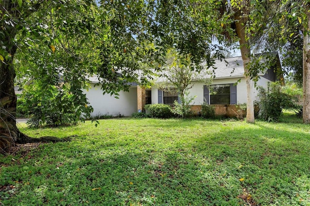 view of front of house with a front yard