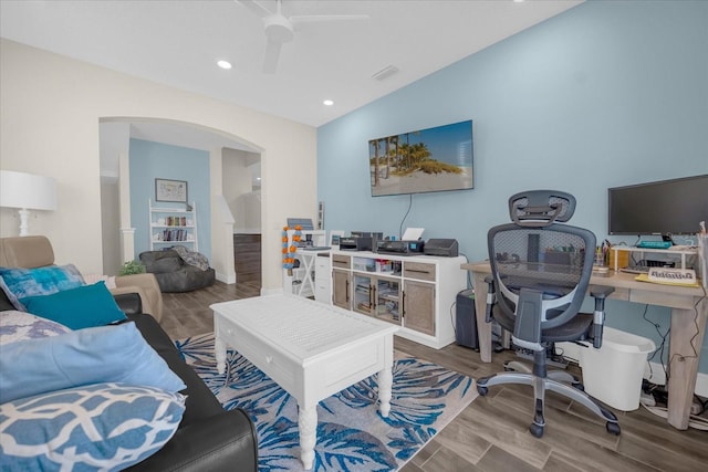 office space with wood-type flooring and ceiling fan