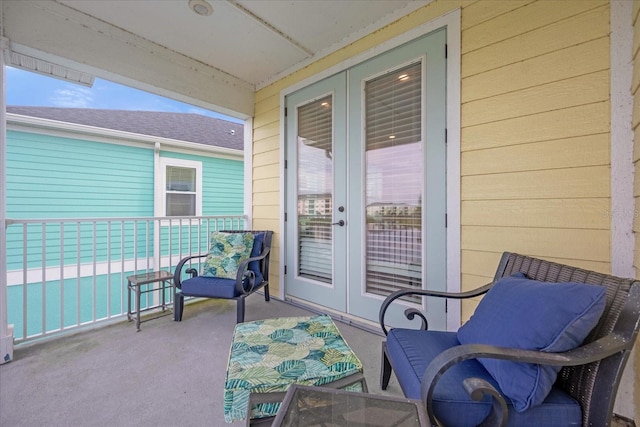 balcony featuring french doors