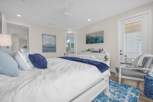 bedroom featuring ceiling fan and hardwood / wood-style floors