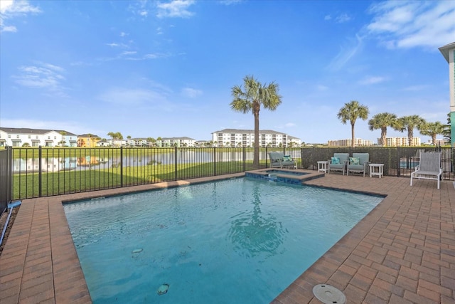 view of swimming pool with a water view, an in ground hot tub, and a patio