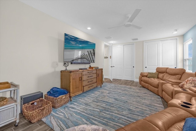 living room with ceiling fan