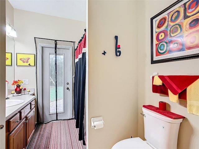 bathroom with vanity and toilet