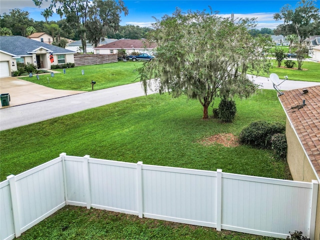 view of yard featuring a garage