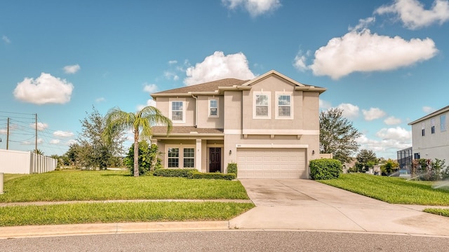 front of property with a front lawn and a garage