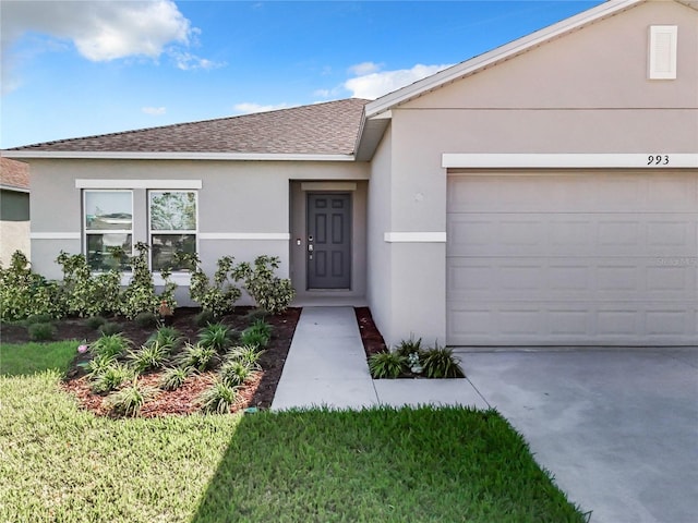 view of front of home with a garage