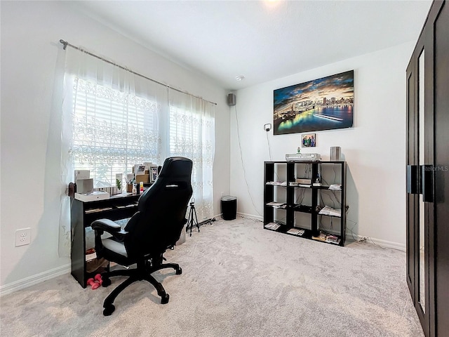 office area with light colored carpet