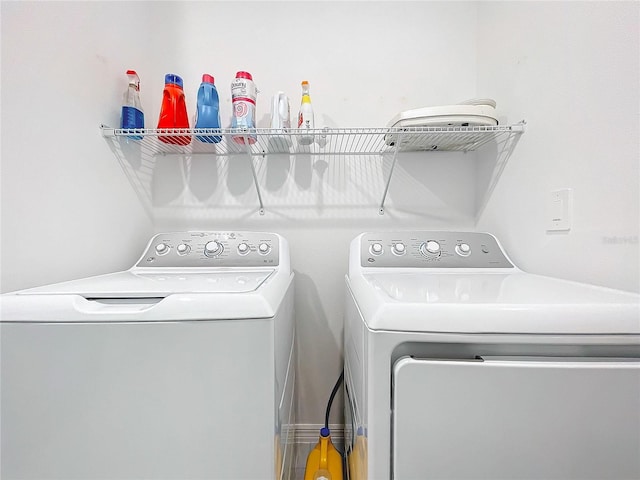 laundry area featuring washing machine and dryer