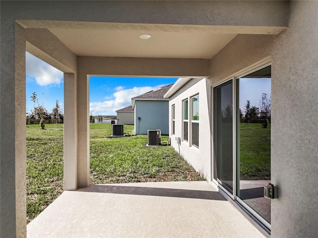 view of patio featuring central AC unit