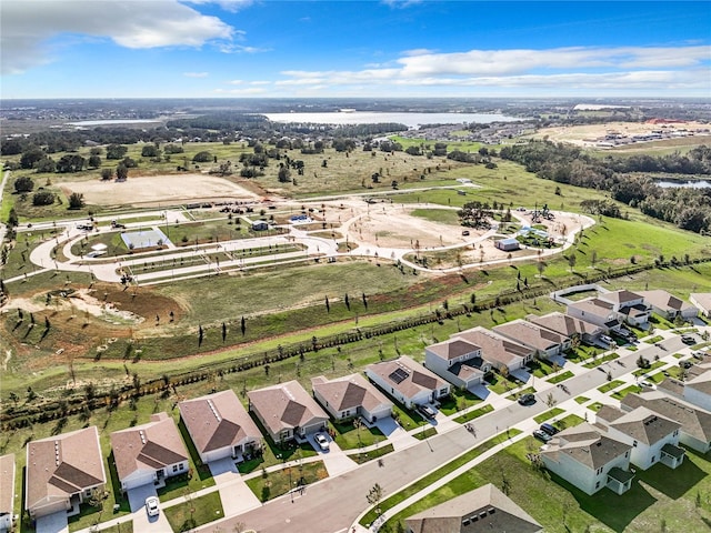 birds eye view of property with a rural view