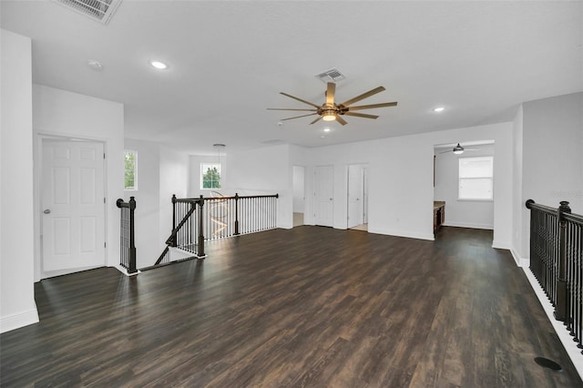 unfurnished room featuring dark hardwood / wood-style flooring