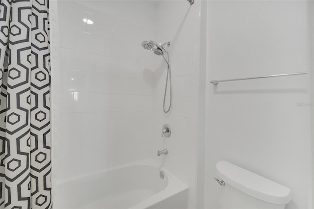 bathroom with shower / tub combo with curtain and toilet