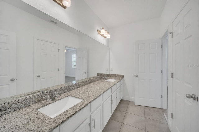 bathroom with tile patterned floors, ceiling fan, and vanity