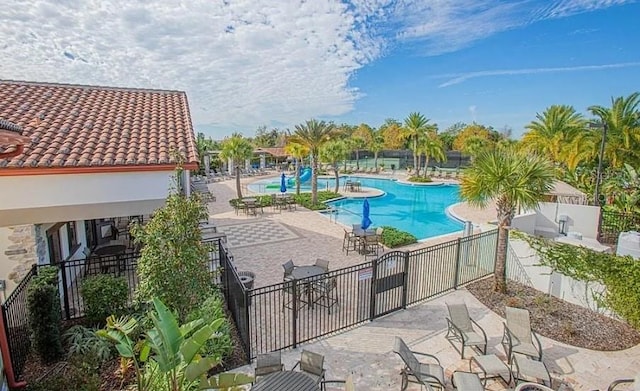 view of swimming pool with a patio area