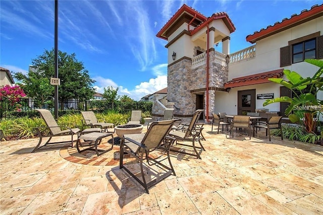 view of patio with a balcony