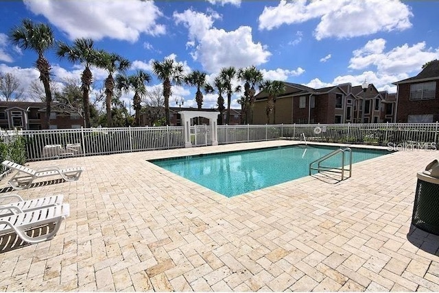 view of pool featuring a patio area