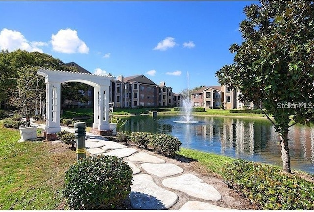 exterior space with a water view