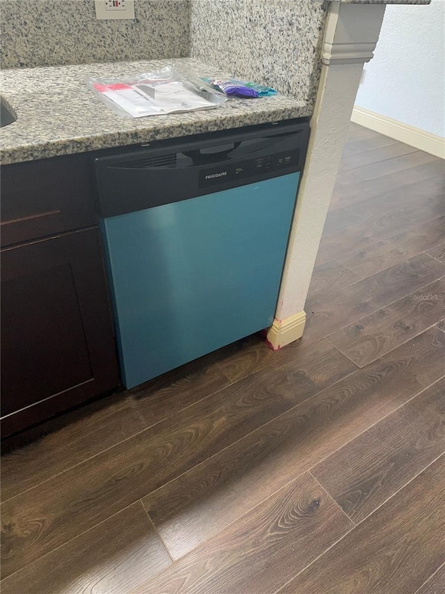 4400 Thornbriar Ln Unit A202, Orlando, FL 32822 - kitchen view of dishwasher, dark wood-style floors, and baseboards