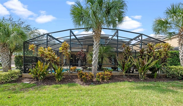 view of yard with a lanai