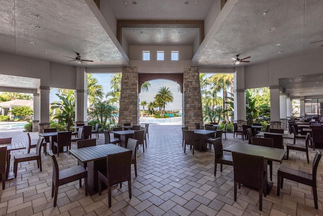 view of patio featuring ceiling fan