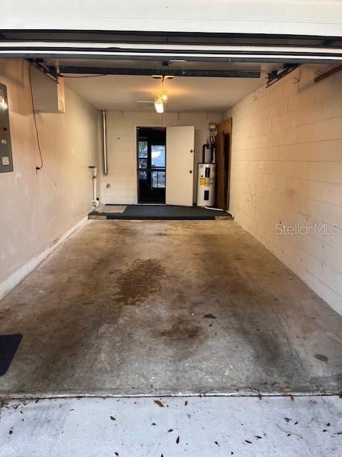 garage featuring electric water heater