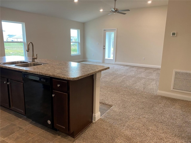 4306 Sagefield Dr, Harmony, FL 34773 - kitchen with dishwasher, a sink, baseboards, ceiling fan, and vaulted ceiling
