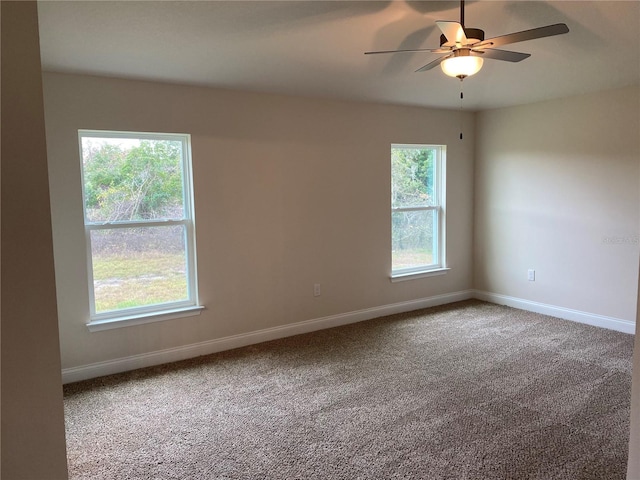 4306 Sagefield Dr, Harmony, FL 34773 - unfurnished room featuring baseboards, ceiling fan, and carpet floors