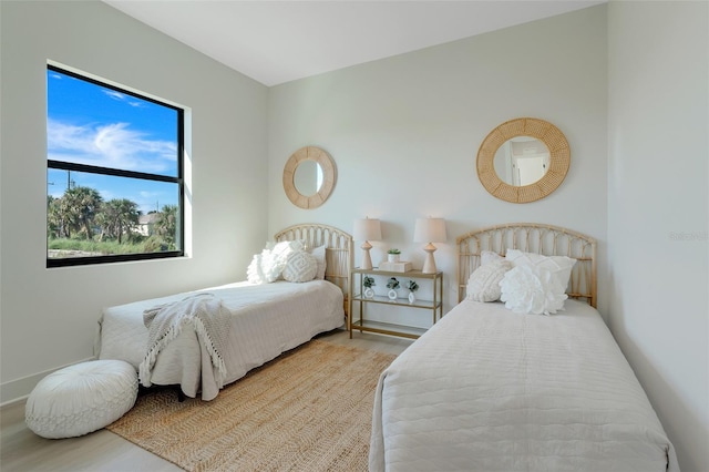 bedroom with wood-type flooring