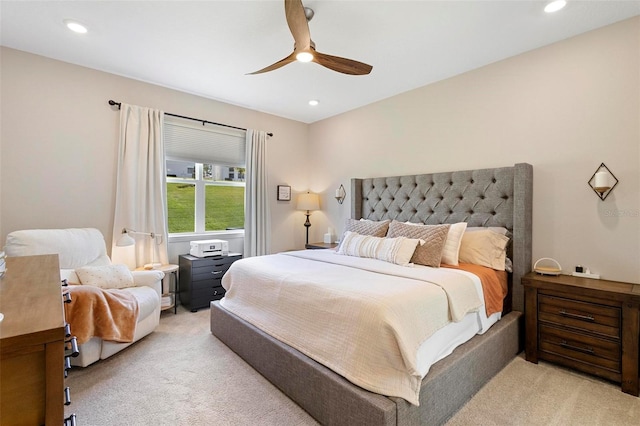 carpeted bedroom with ceiling fan