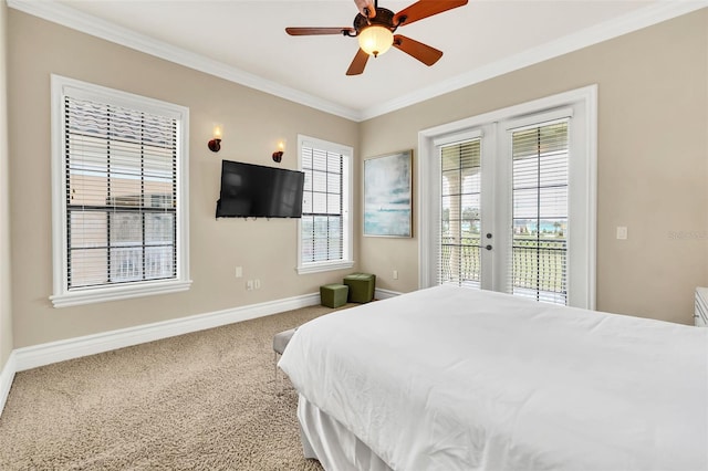 carpeted bedroom featuring access to outside, ornamental molding, and ceiling fan