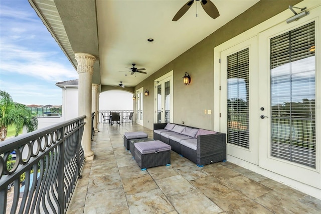 view of patio featuring outdoor lounge area, ceiling fan, and french doors