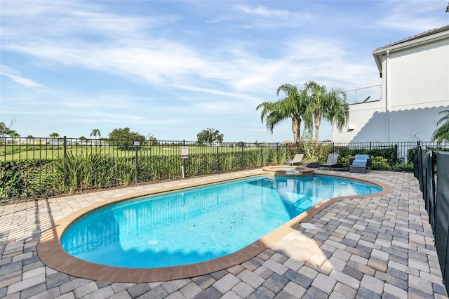 view of swimming pool featuring a patio area